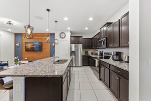 Fridge, microwave, oven, stovetop - Modern 5BR Villa w/ Private Pool at Windsor (Kissimmee)