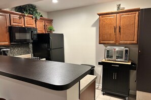 Fridge, microwave, stovetop, coffee/tea maker