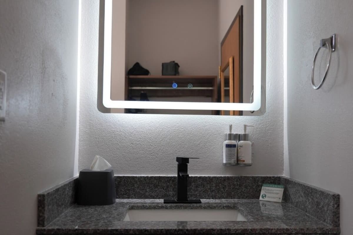 Combined shower/bathtub, hair dryer, towels, soap