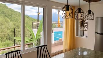 Deluxe appartement, uitzicht op bergen | Dineren