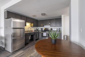 Fridge, dining tables - Landing | Beautiful 1BD, Game Room, Pool (Hartford)
