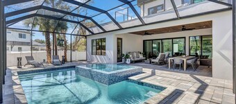 Modern Home + Heated Pool + Spa + Walkable Downtown + Short Drive to Beaches