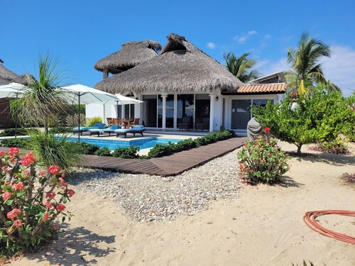 Beach Bungalow with stunning Pacific Ocean and Mountain views awaits!