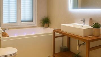 Shower, jetted tub, hair dryer, bidet