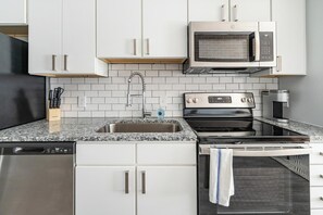Fridge, dining tables - Landing | Spectacular 1BD, Yoga Studio, Game Room (Bellview)
