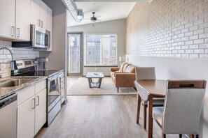 Fridge, dining tables - Landing | Beautiful 1BD, Pool, Game Room (Bellview)