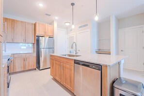 Fridge, dining tables - Landing | Stylish 2BD, Gym, Pool (Palm Bay)