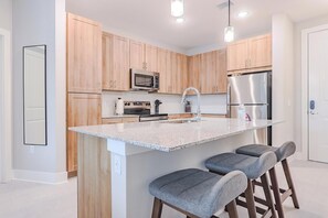 Fridge, dining tables - Landing | Spectacular 2BD, Pool, Clubhouse (Palm Bay)