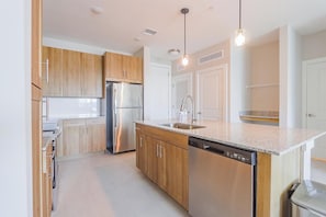 Fridge, dining tables - Landing | Spectacular 2BD, Pool, Gym (Palm Bay)
