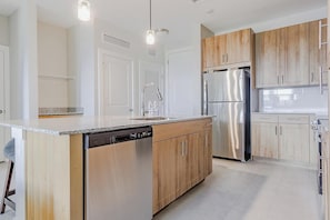 Fridge, dining tables - Landing | Stunning 2BD, Pool, Gym (Palm Bay)