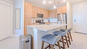 Fridge, dining tables - Landing | Beautiful 2BD, Pool, Gym (Palm Bay)