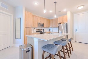 Private kitchen - Landing | Beautiful 2BD, Pool, Gym (Palm Bay)