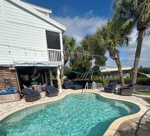 Outdoor pool, a heated pool - Island Living; Pool, Hot Tub, Dock, Near Beach, Outdoor Entertaining Area, 4BR (Palm Island - Don Pedro Island)