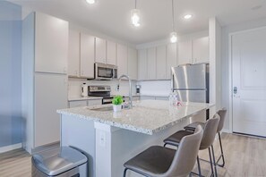 Fridge, dining tables - Landing | Stunning 2BD, Gym, Pool (Palm Bay)