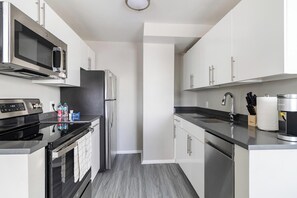 Fridge, dining tables - Landing | Incredible 1BD, Gym (New Haven)