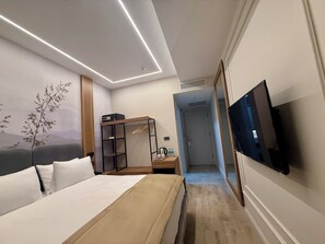 Chambre Deluxe | Literie hypoallergénique, minibar, coffres-forts dans les chambres