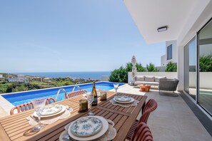 Outdoor dining - Sunny Ocean View Villa - Calma (Estreito da Calheta)