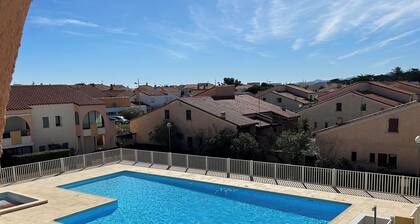 Apartment in secure residence with swimming pool and parking space