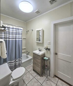 Hair dryer, towels, soap, toilet paper