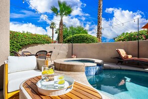 A pool area with lounge chairs, a hot tub, and a table with drinks. - Casa Capri-Walking Distance to Old Town LQ + Park (La Quinta)