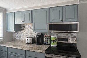 Microwave, oven, stovetop, coffee/tea maker - Entire 3BR Apartment Comfortable City Stay (Bethpage)