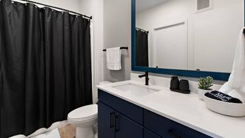 Hair dryer, towels, soap, toilet paper