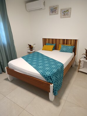 2 dormitorios, tabla de planchar con plancha, wifi gratis y ropa de cama