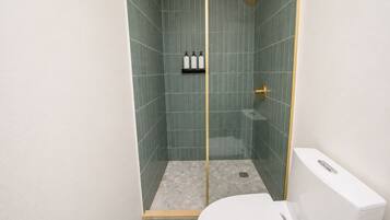 Apartment, City View | Bathroom | Shower, hair dryer, shampoo, toilet paper
