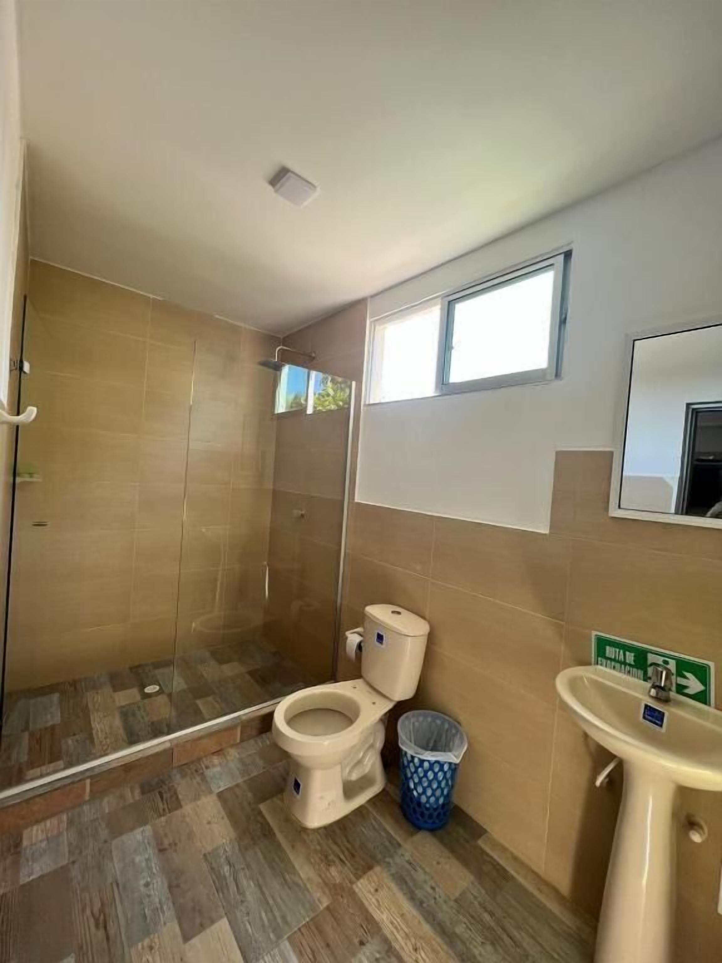 Shower, towels, soap, toilet paper