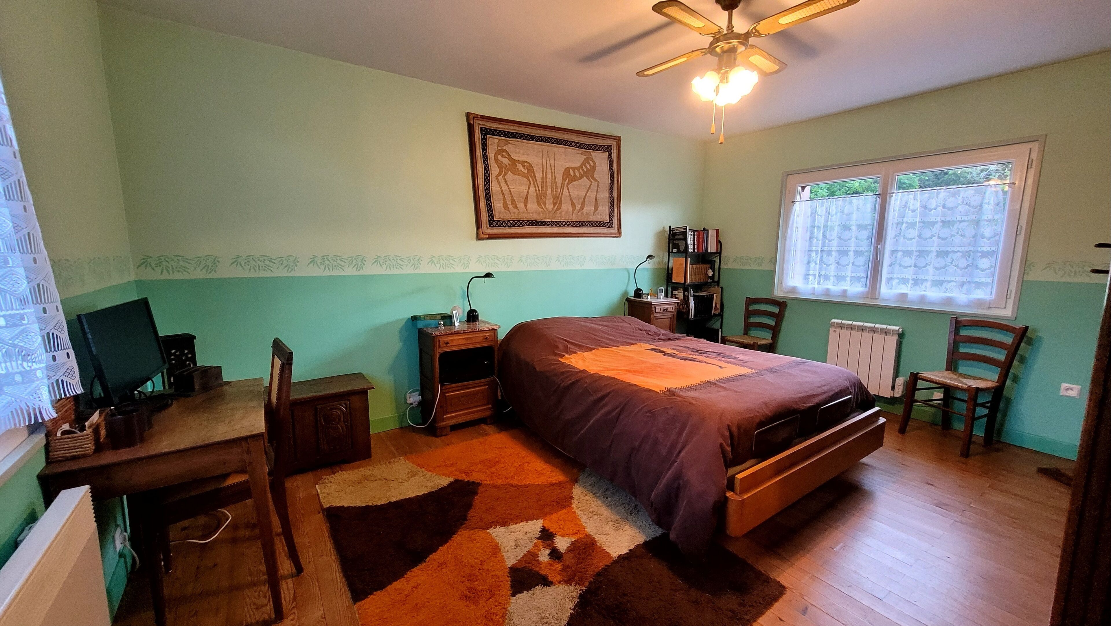 2 slaapkamers, een strijkplank/strijkijzer