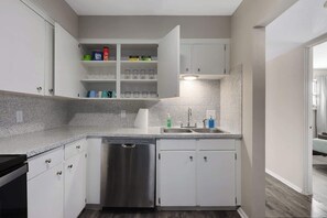 Fridge, microwave, oven, stovetop - Newly Remodeled 2BR Apartment with King Beds (Kansas City)