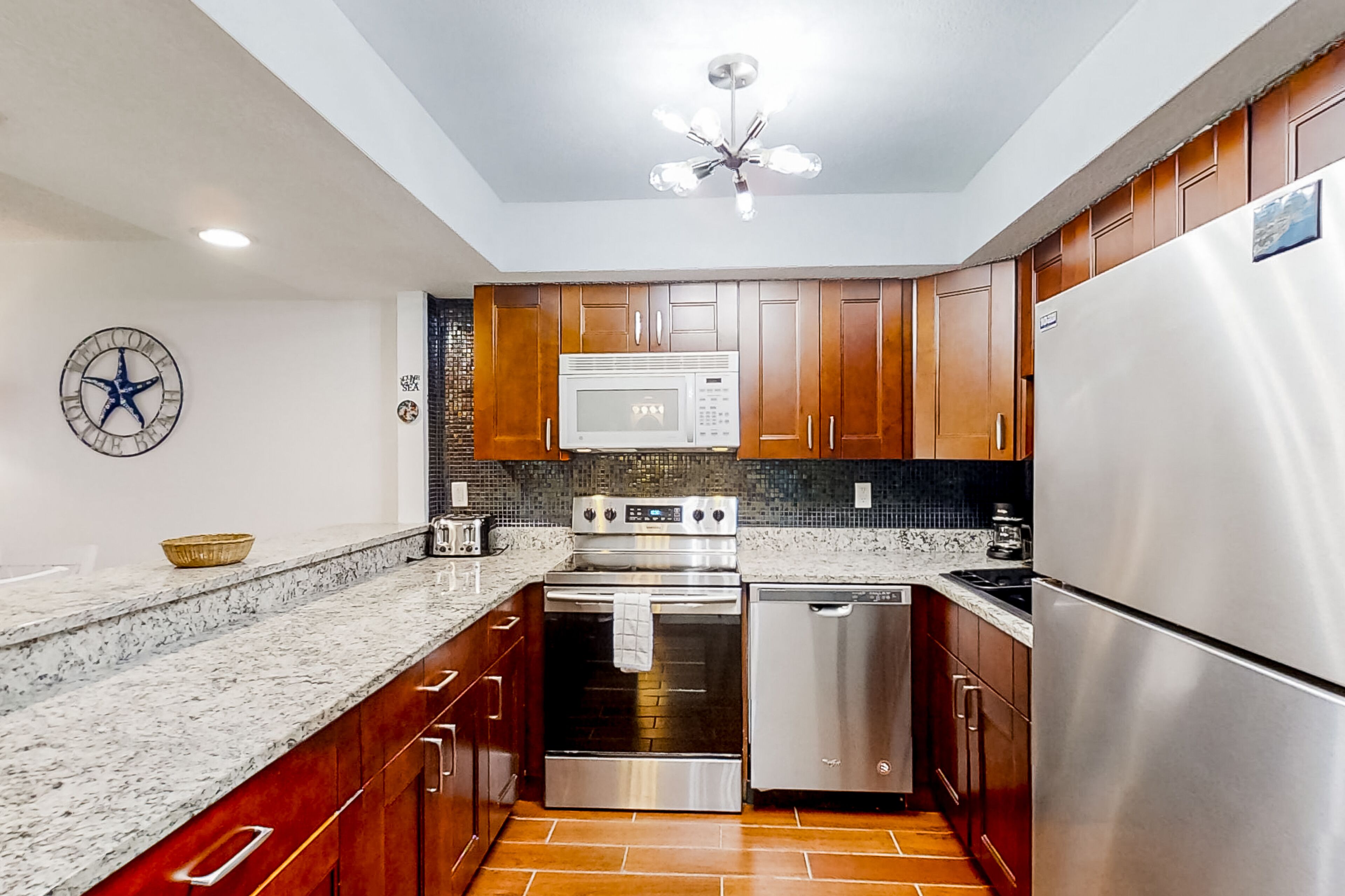 Condo, Multiple Beds, Patio, Garden View (Pelican's Cove C118) | Private kitchen