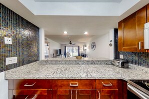 Condo, Multiple Beds, Patio, Garden View (Pelican's Cove C118) | Private kitchen - Condo Across the Street From the Beach With Pool, Tennis, &. Washer/dryer (St. Augustine)