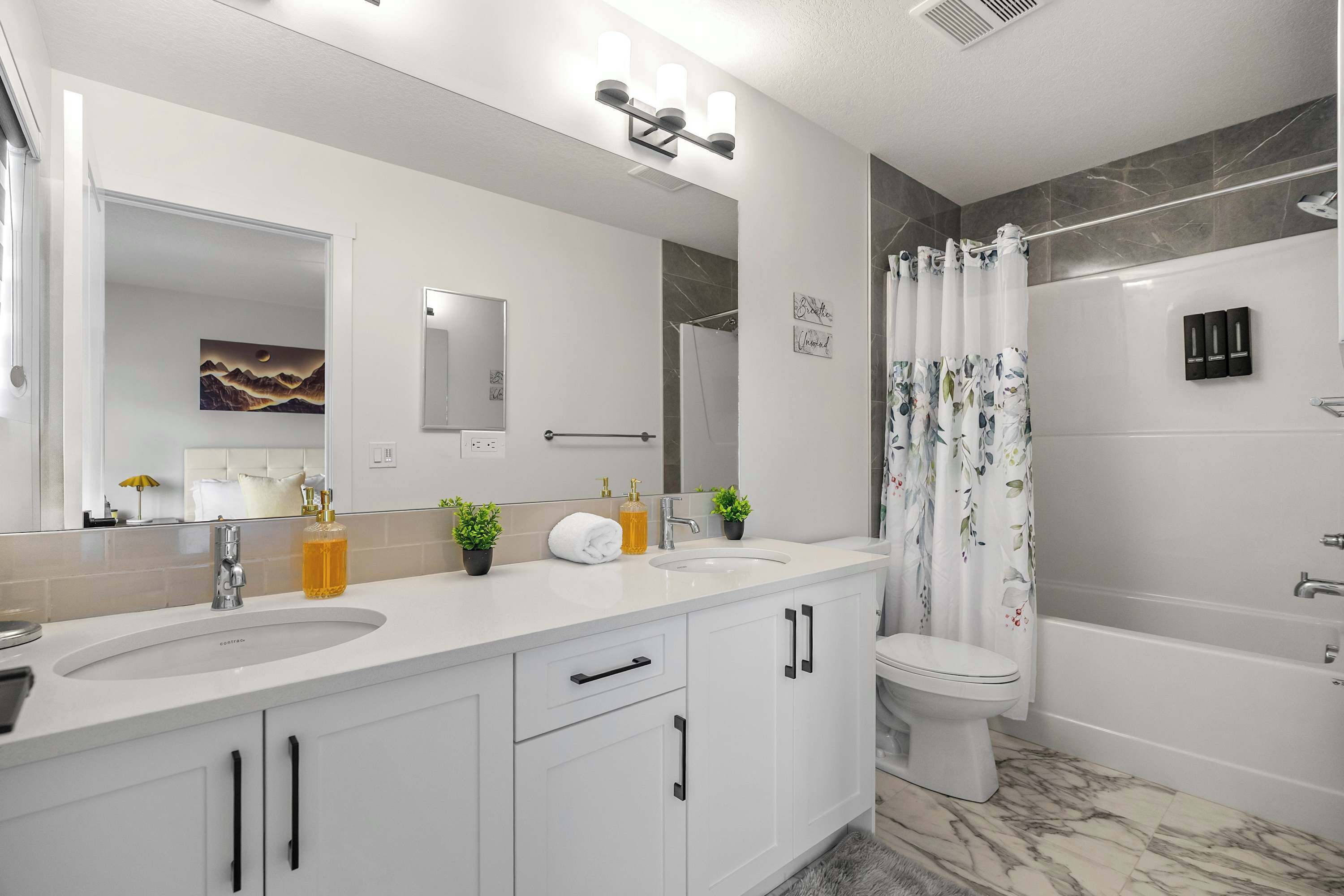 Shower, hair dryer, towels, shampoo