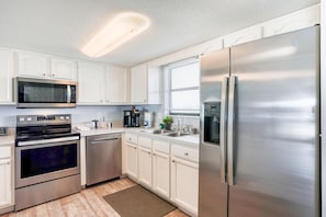 Appartamento, letti multipli, balcone, vista spiaggia (Tranquil Vista) | Cucina privata