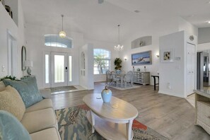 House, Multiple Beds, Pool Access, Pool View (The Lillie Pad) | Living area - Contemporary Coastal Escape With Heated Pool, Fenced Yard, & Outdoor Dining (Palm Coast)