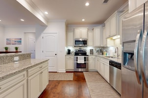 Casa adosada, varias camas, patio, vistas al jardín (Mariner's Landing 602) | Cocina privada