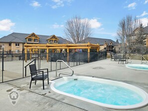 Outdoor spa tub - Bighorn Resort 3BR Condo Getaway (Radium Hot Springs)