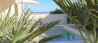 Luxurious Sea-Facing Villa with Heated Pool - 4 Bedrooms, Private Beach Access