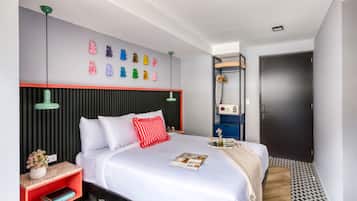 A modern bedroom with a bed, bedside tables, a wall-mounted shelf, and a door.