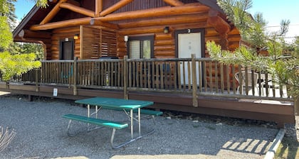 Cozy cabin and a beautiful waterfront view from your deck. The perfect getaway!