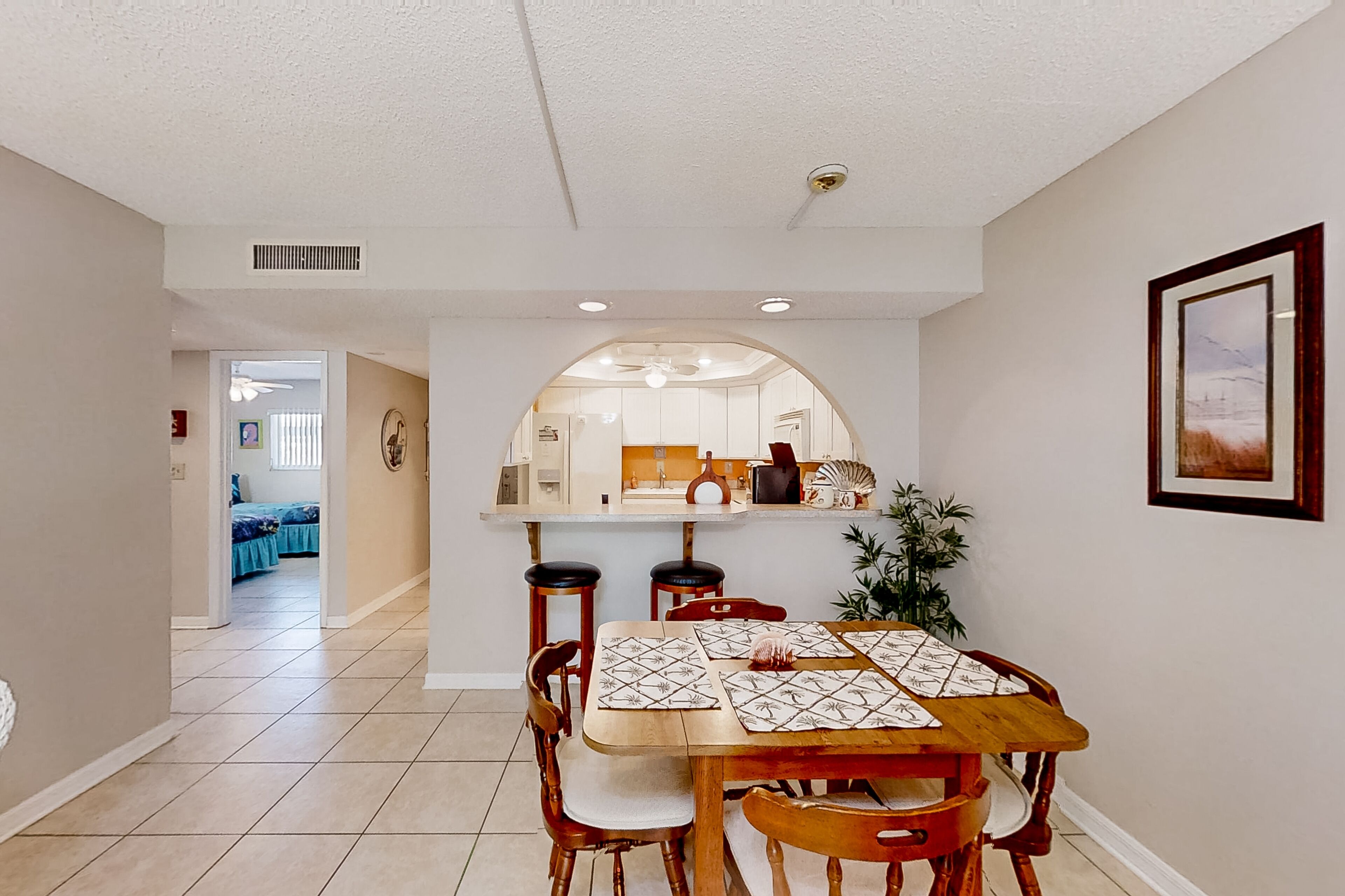 Condo, Multiple Beds, Kitchen, Pool View (Pelican Inlet E133) | 2 bedrooms, individually decorated, individually furnished, bed sheets