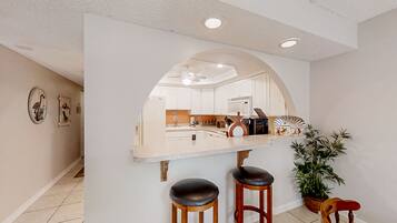 Condo, Multiple Beds, Kitchen, Pool View (Pelican Inlet E133) | Private kitchen
