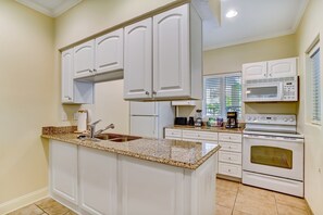 Condo, Multiple Beds, Balcony, Pool View (2509-10 Tennis Villas) | Private kitchen - Dog-friendly Home in the Tennis Villas W/free Wifi, Shared Pool, Central AC (Fernandina Beach)