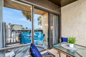 Outdoor dining - Modern Oceanview Condo With Multiple Balconies, Pool & W/D - Beach Access (St. Augustine)