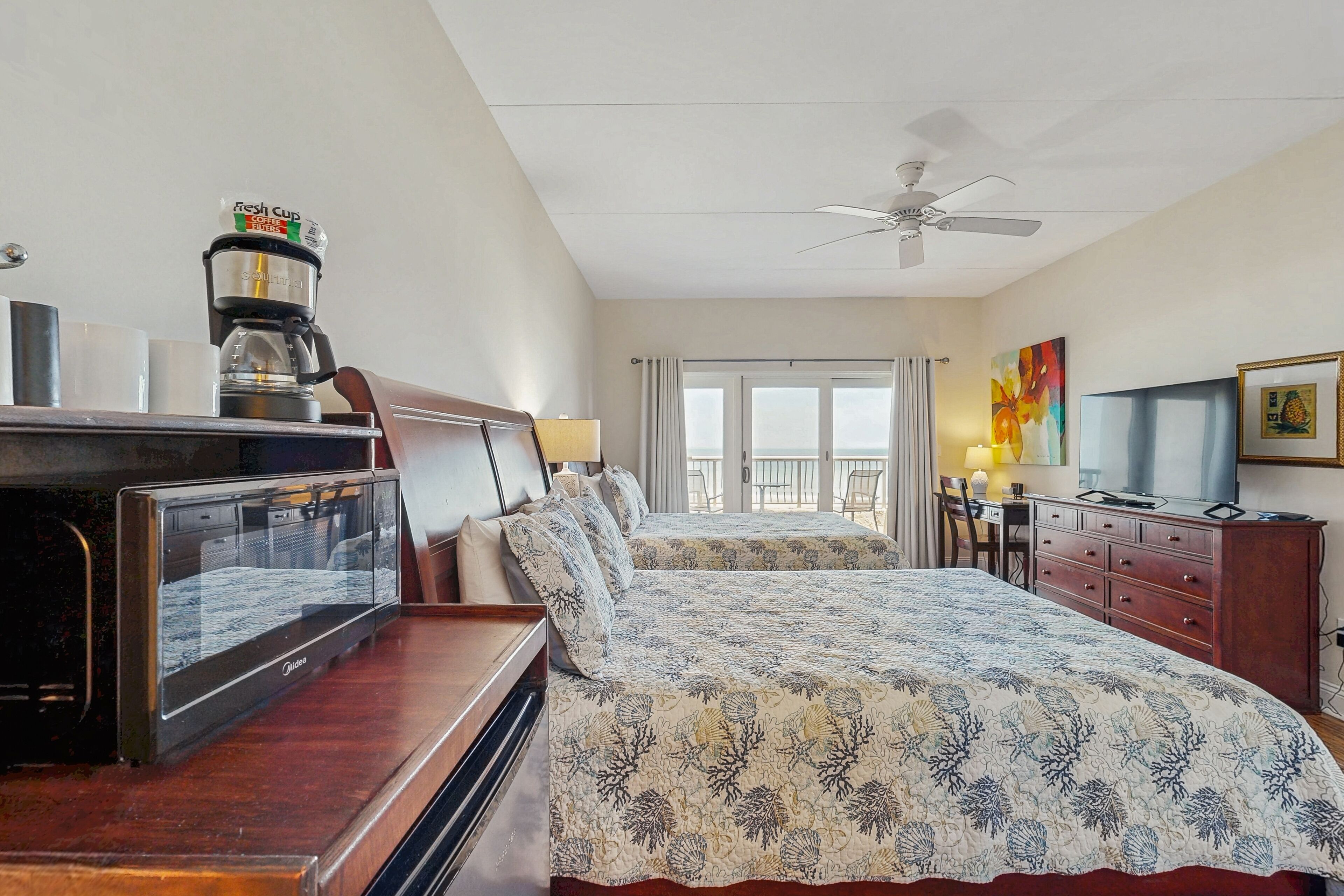 Condo, 2 Queen Beds, Balcony, Ocean View (225 Sandcastles - Hotel Side) | 1 bedroom, individually decorated, individually furnished, bed sheets
