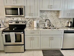 Private kitchen - Family-friendly 2-bedroom beach-front condo! (New Smyrna Beach)