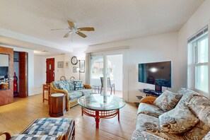 House, Multiple Beds, Patio, Partial Ocean View (Seaside Cottage) | Living area - Spacious Seaside Cottage w/ Sunroom 1-minute Walk to Vilano Beach (St. Augustine)
