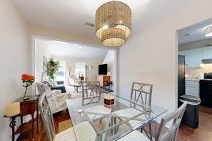 Condo, Multiple Beds, Patio, Garden View (Beach Therapy) | 3 bedrooms, individually decorated, individually furnished - Spacious Centrally Located Condo With Patio, Open Layout, Smart Tvs, AC, & W/D (St. Simons Island)