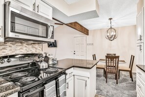 Condo, Multiple Beds, Balcony, Pool View (Forest Ridge 2725) | Private kitchen - Quiet Coastal Escape Within Walking Distance to Beach With Shared Pool (Fernandina Beach)